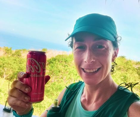 Rachel training in Thailand for the Transgrancanaria. Drinking a coke after a run in the heat